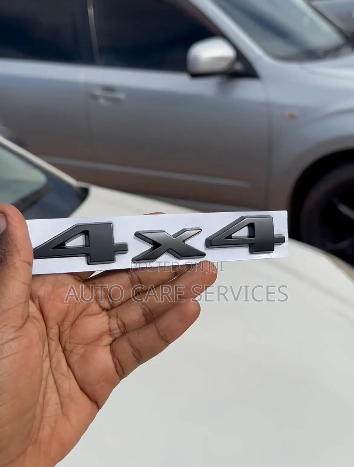 Car Behind Letters