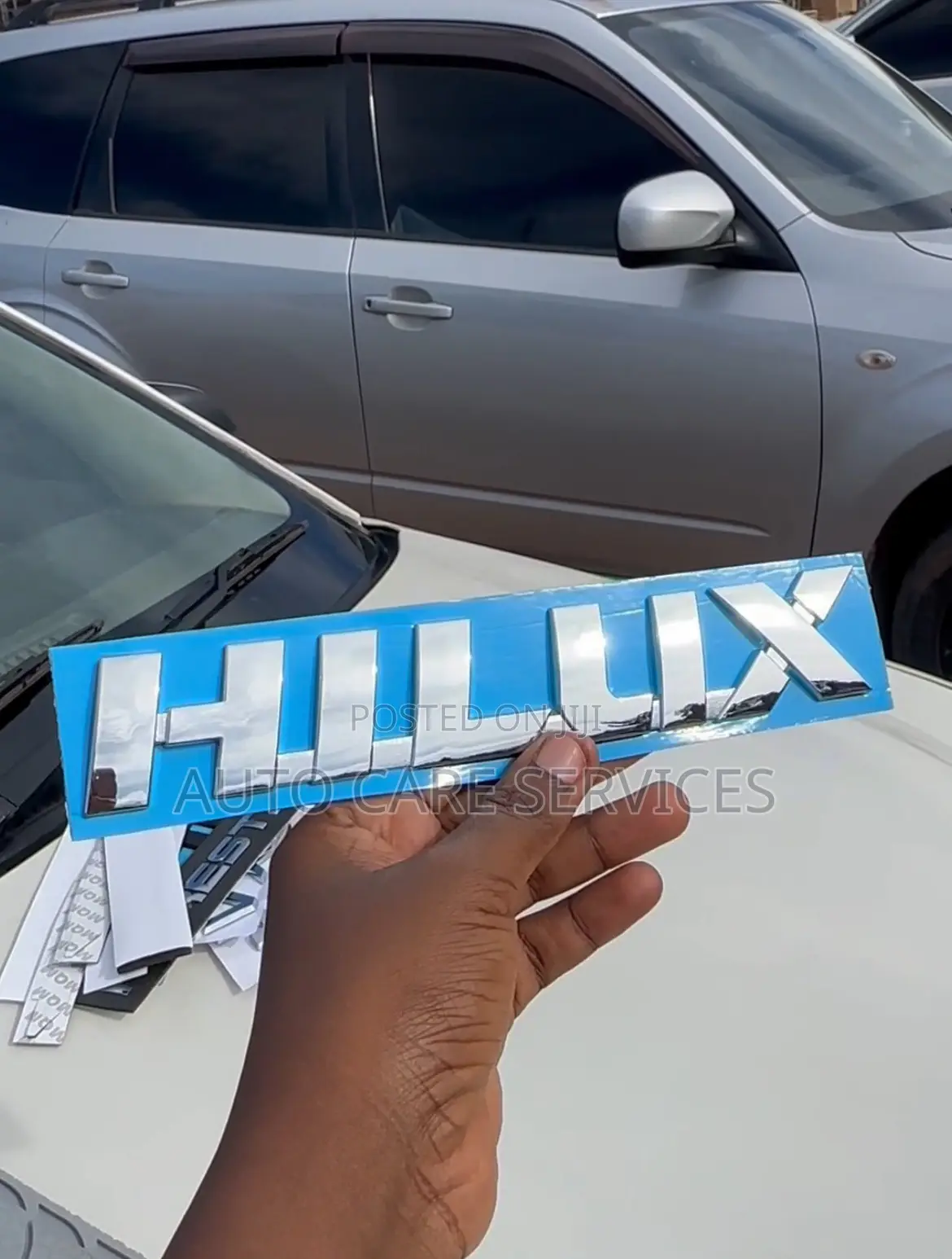 Car Behind Letters