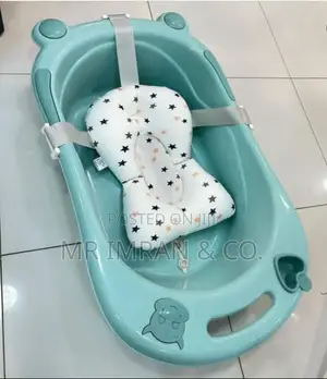 Portable Baby Bathtub With An Adjustable Anti-slip Cushion Pad.