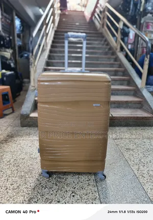 Exotic Plastic Suitcases. Medium Size
