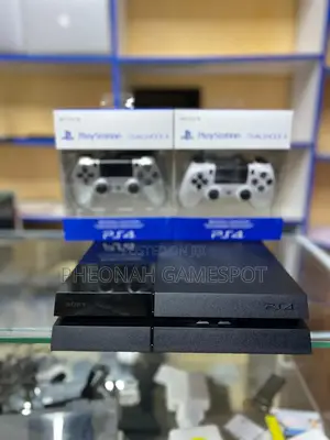Playstation 4 - 13 Games, 2 Pads, Receipt, 6 Months Warranty. Full Set