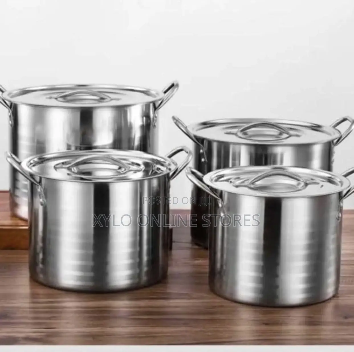 A 4 Piece Set of Stainless Steel Cookware