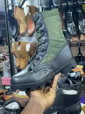 Black Leather Boot Combat With a Green Canvas