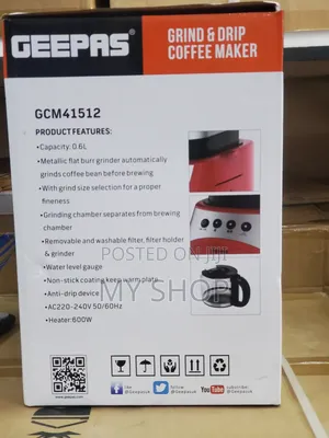A Coffee Maker With a Coffee Grinder on It