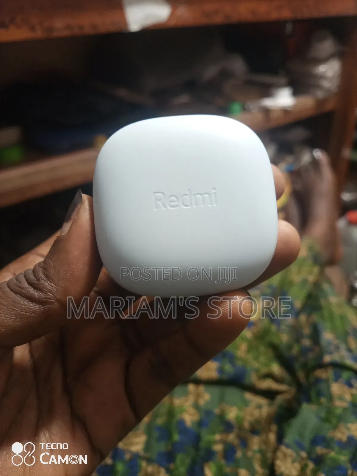 Redmi Buds 6 Play Wireless Earbuds in a Light Blue Color.