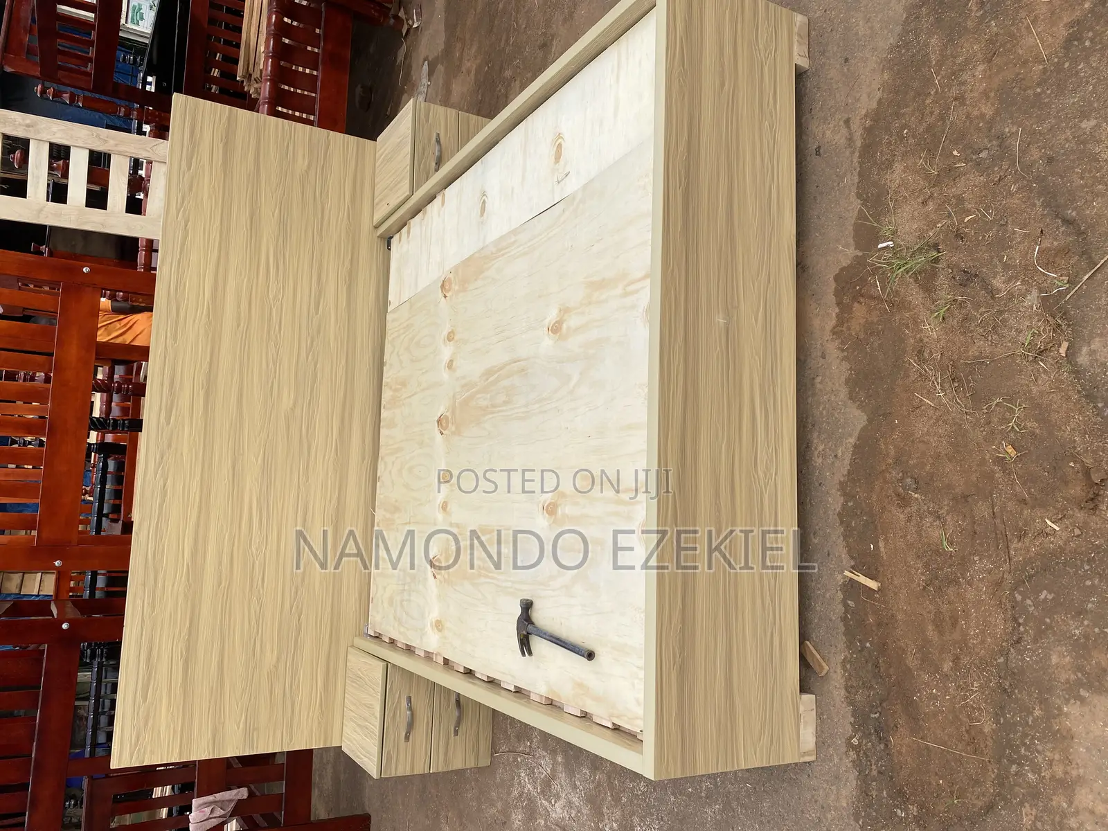 A Bed With Bedside Table and Mattress