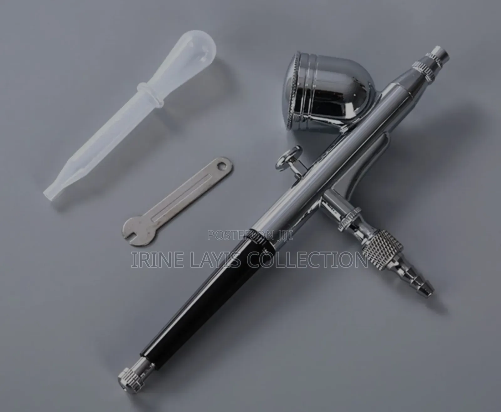 Dual-Action Gravity Feed Airbrush Gun.