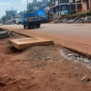 Commercial Plot Measuring on Tarmac of Salaama Munyonyo Rd Quicksale