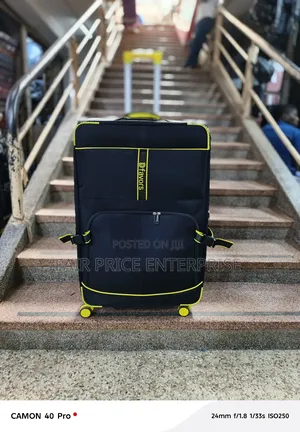 Original Traveling Cloth Suitcases. Medium Size