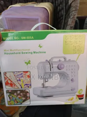 Mini Portable Sewing Machine.