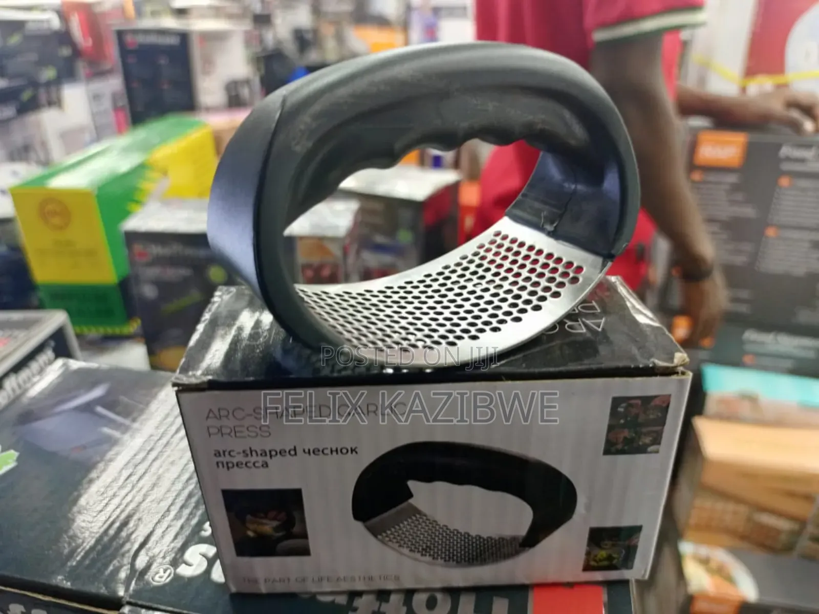 Arc-Shaped Garlic Press.