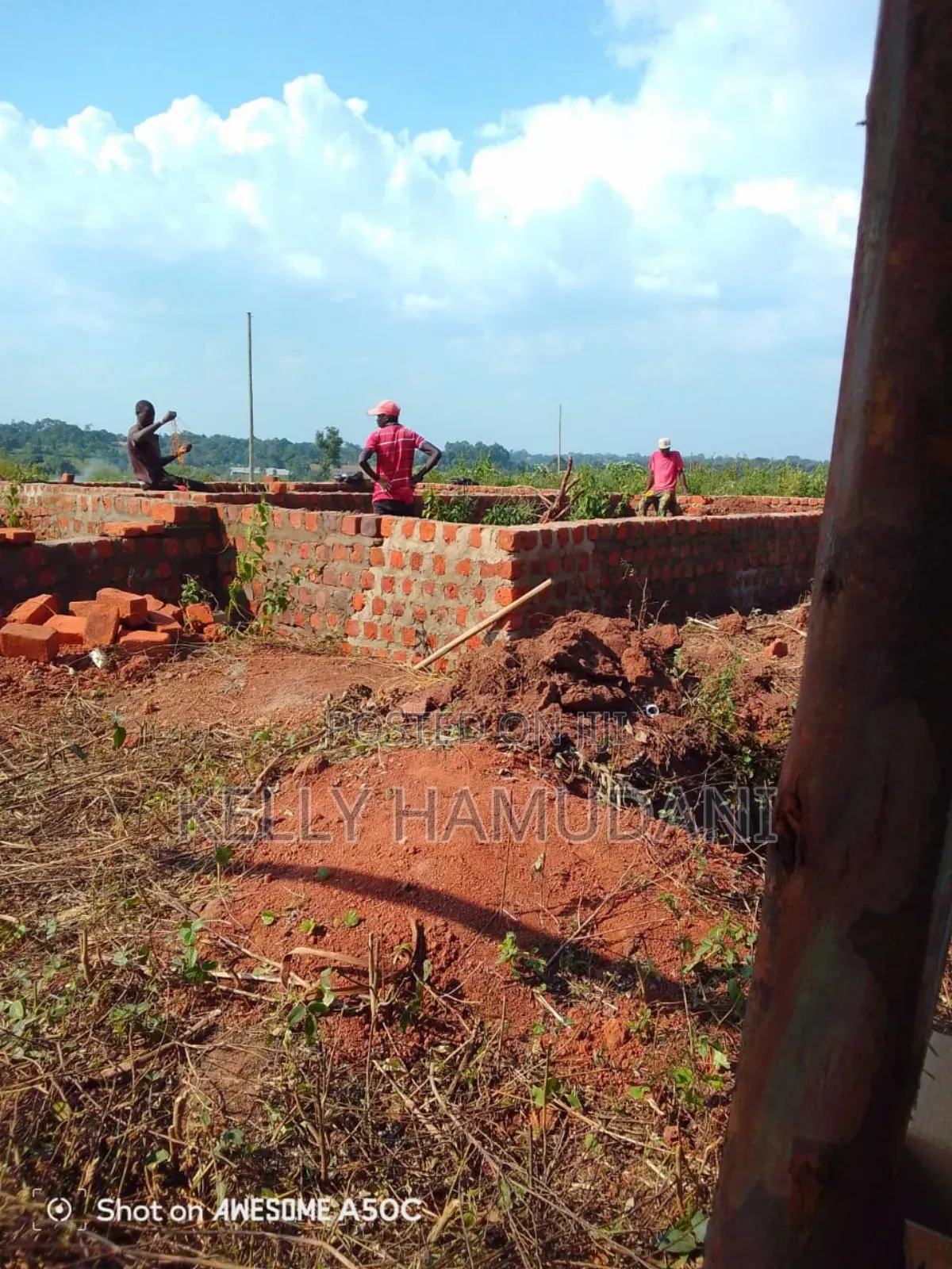 Land With Unfinished House