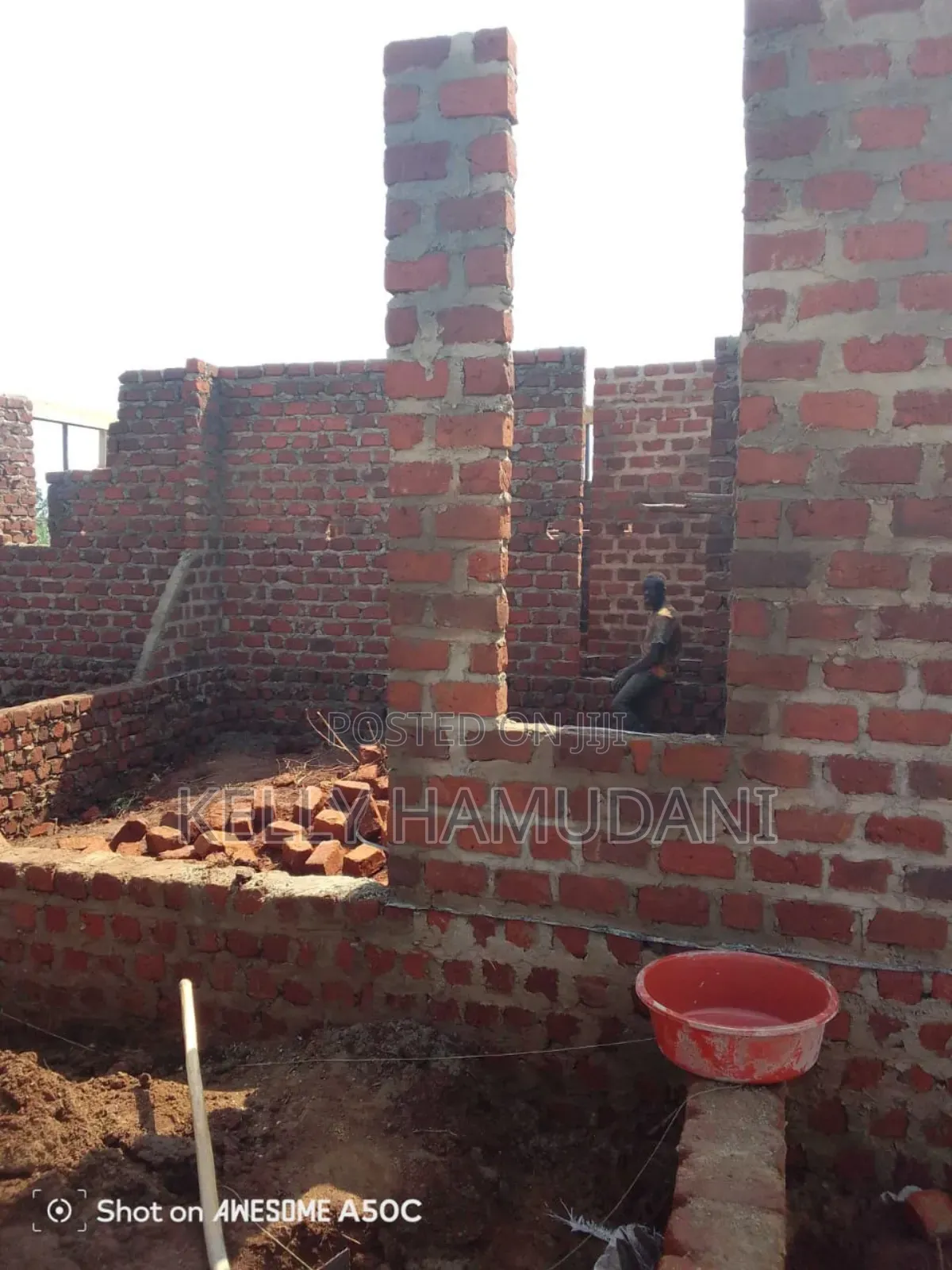 Land With Unfinished House