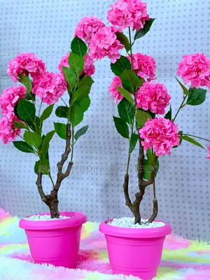 Artificial Flower With Pink Vessel And White Stones