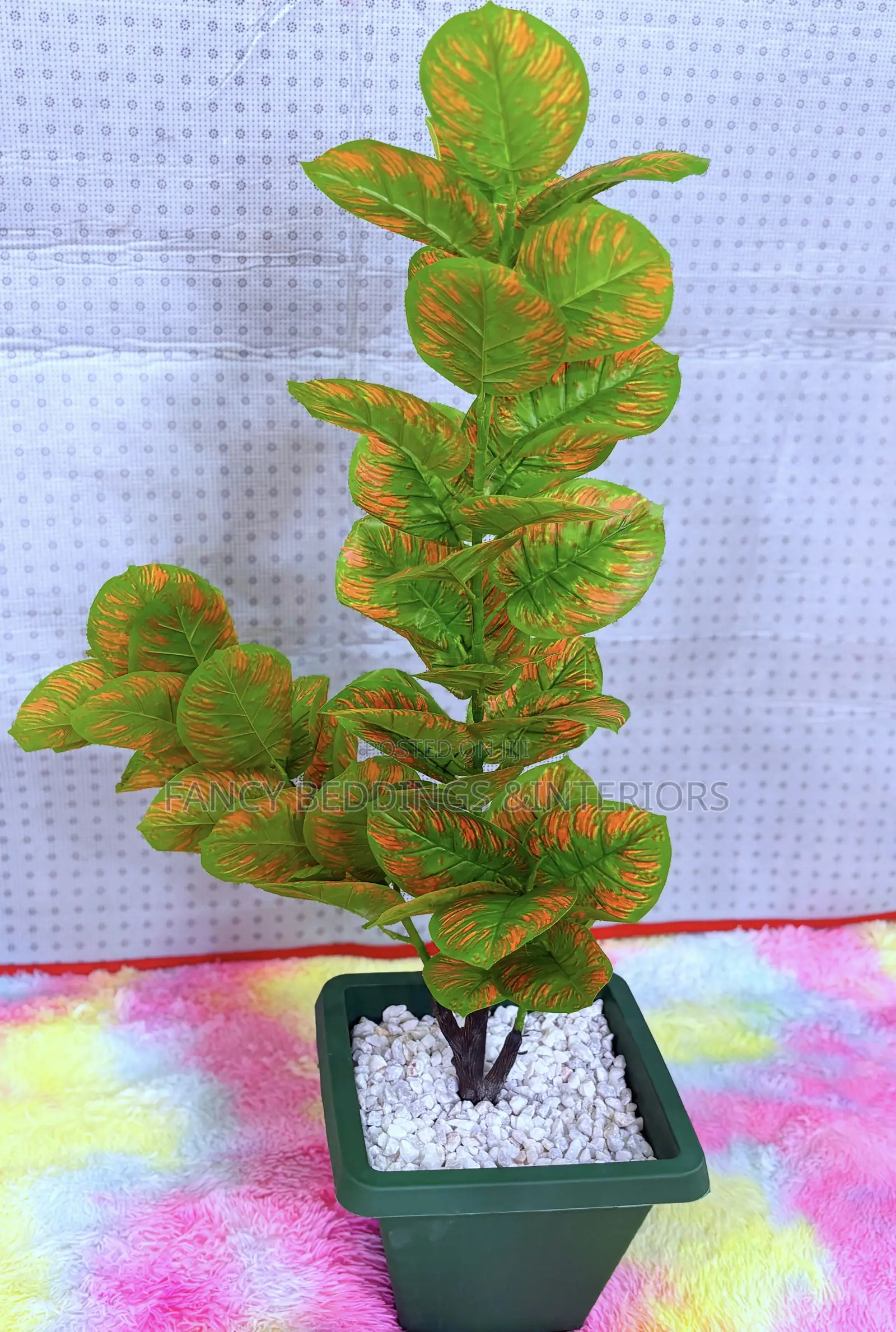 Artificial Plant With Vessel and White Stones