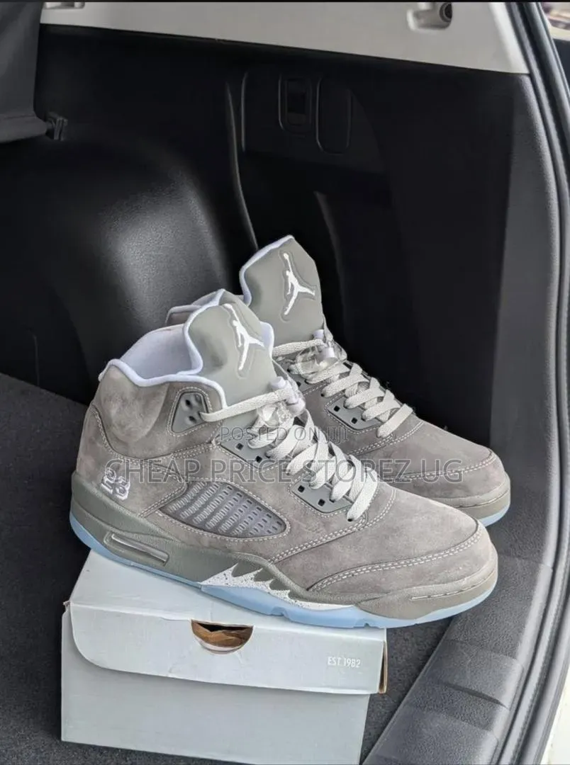 The of Nike Air Jordan 5 Retro Sneakers in the Wolf Grey Colorway. Man
