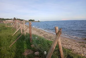 7acres for Sale at Garuga Lake Touch After Pearl Marina~Entebbe Road.