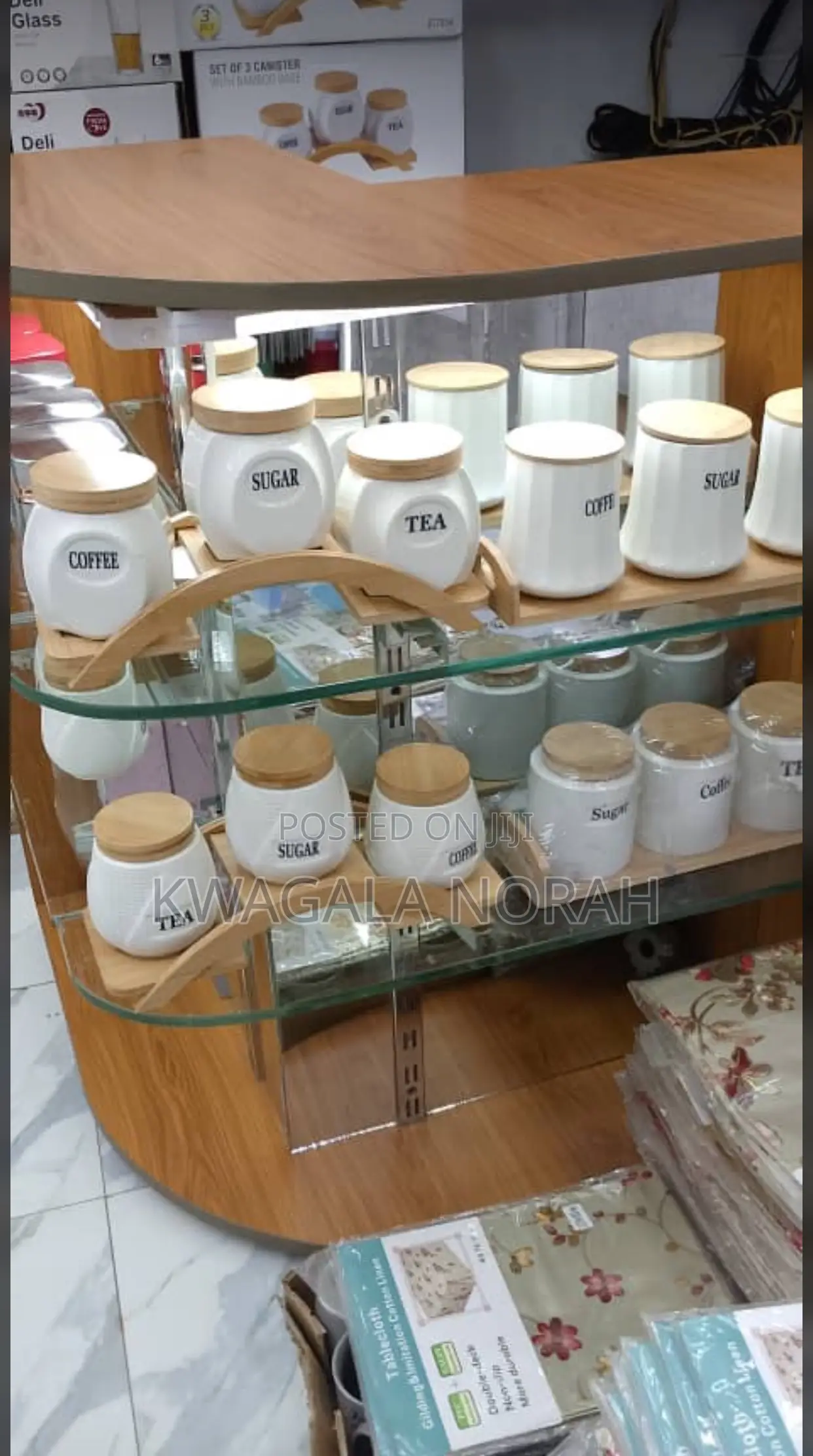 A Set of 3 White Ceramic Kitchen Canisters With Bamboo Lid