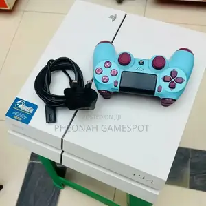 Playstation 4. Ps4 Comes With 12 Games and 2 Pads. I Am Moving Abroad