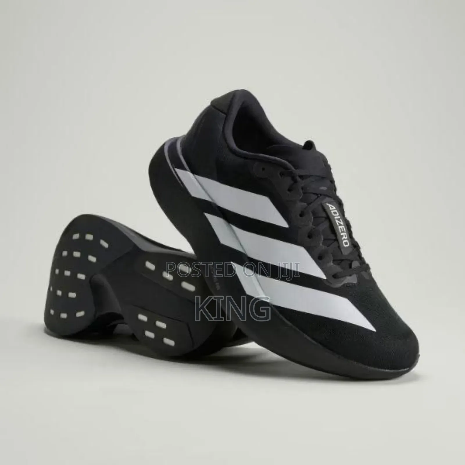 Adidas Adizero Evo Sl, a Lightweight Hybrid Training and Racing Shoe.