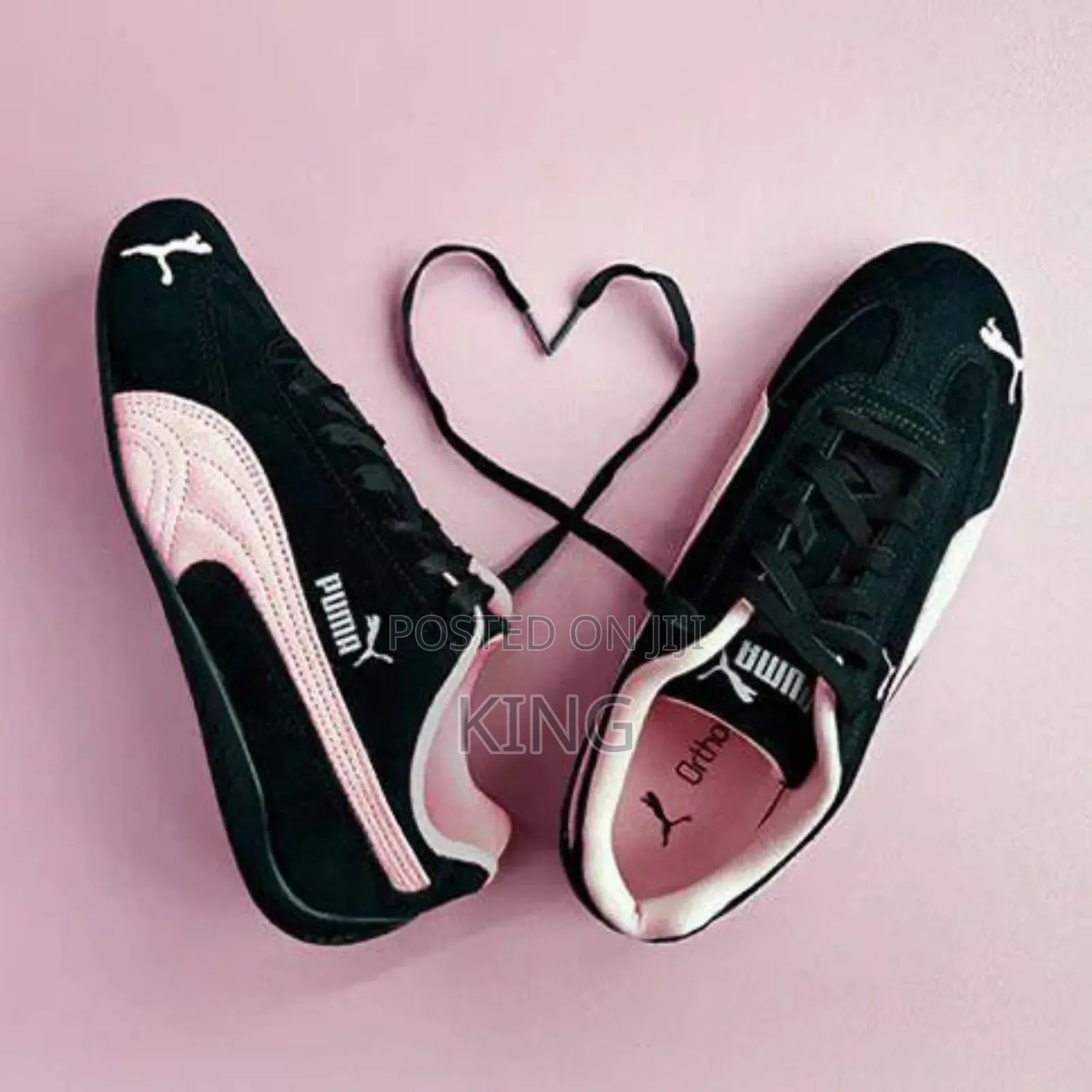 Puma Speedcat Og Sneaker in a Black and Pink Colorway.