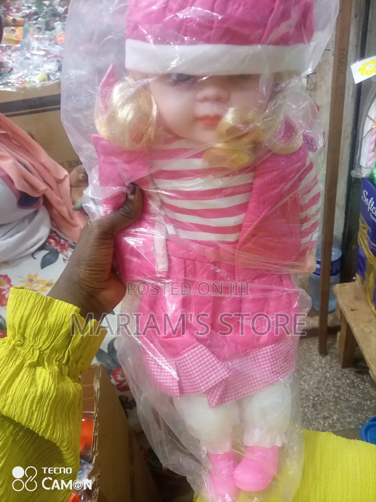Baby Girl Doll Toy, Often Packaged in Plastic for Protection.