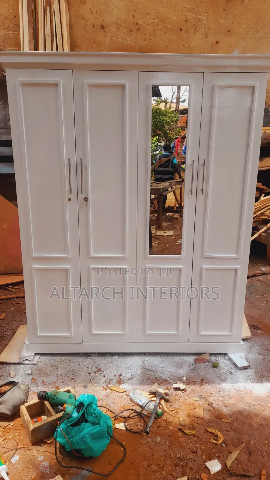 Well Finished Wardrobe in White and a Mirror