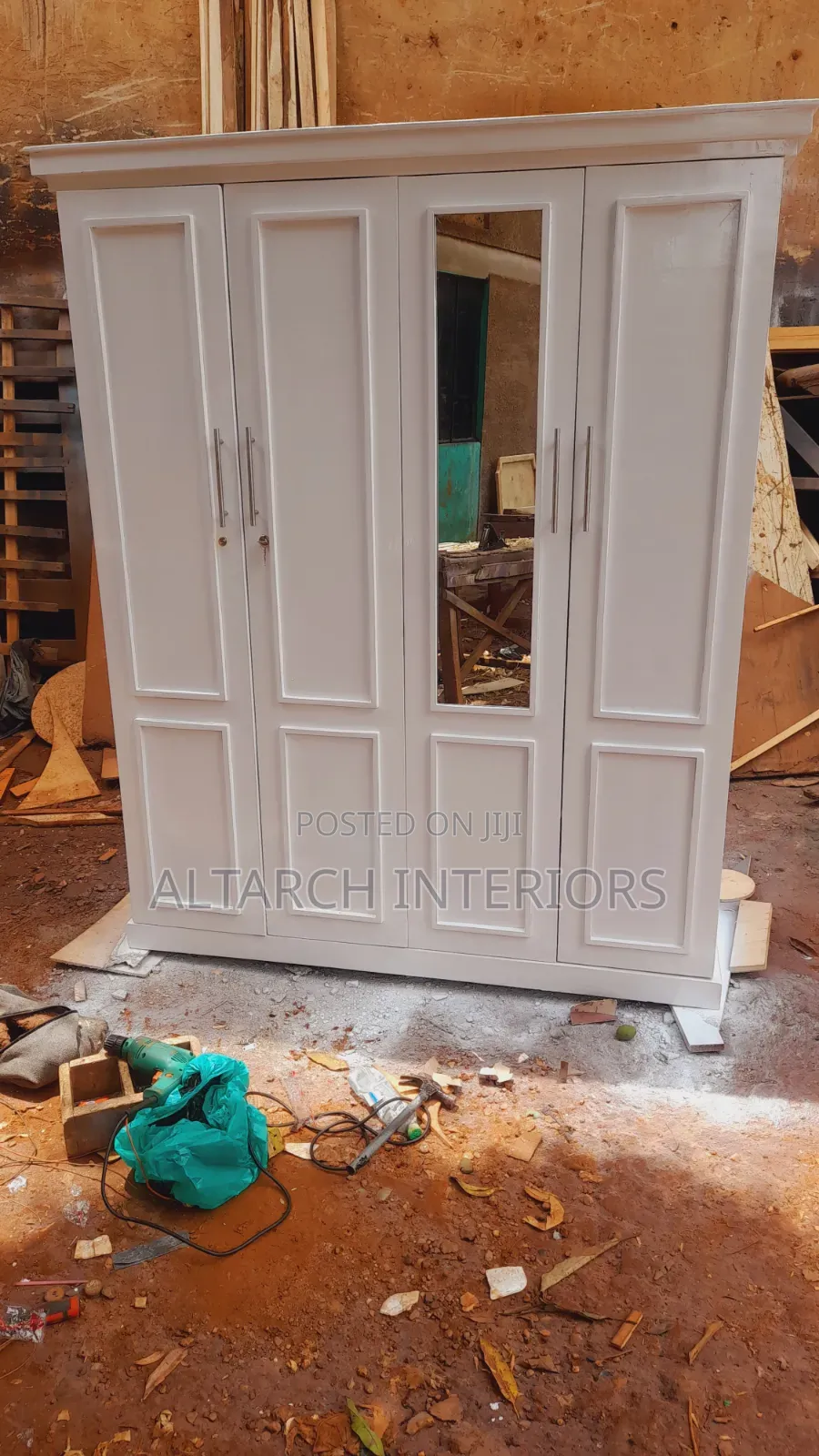 Well Finished Wardrobe in White and a Mirror
