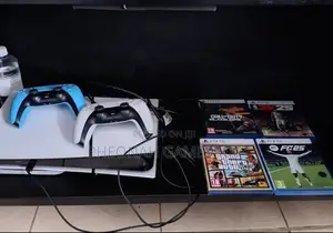 Home Used Playstation 5 Slim Disc Version. With 2 Controllers and Game
