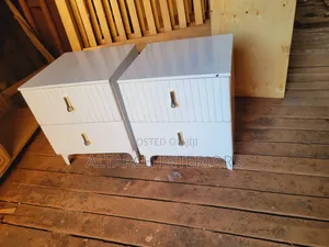 Well Furnished White Bedside Drawers With Unique Handles