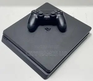 Sony Playstation 4 Slim Console W/ Controller and Games