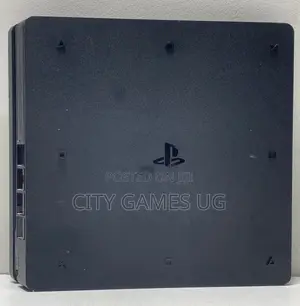 Sony Playstation 4 Slim Console W/ Controller and Games