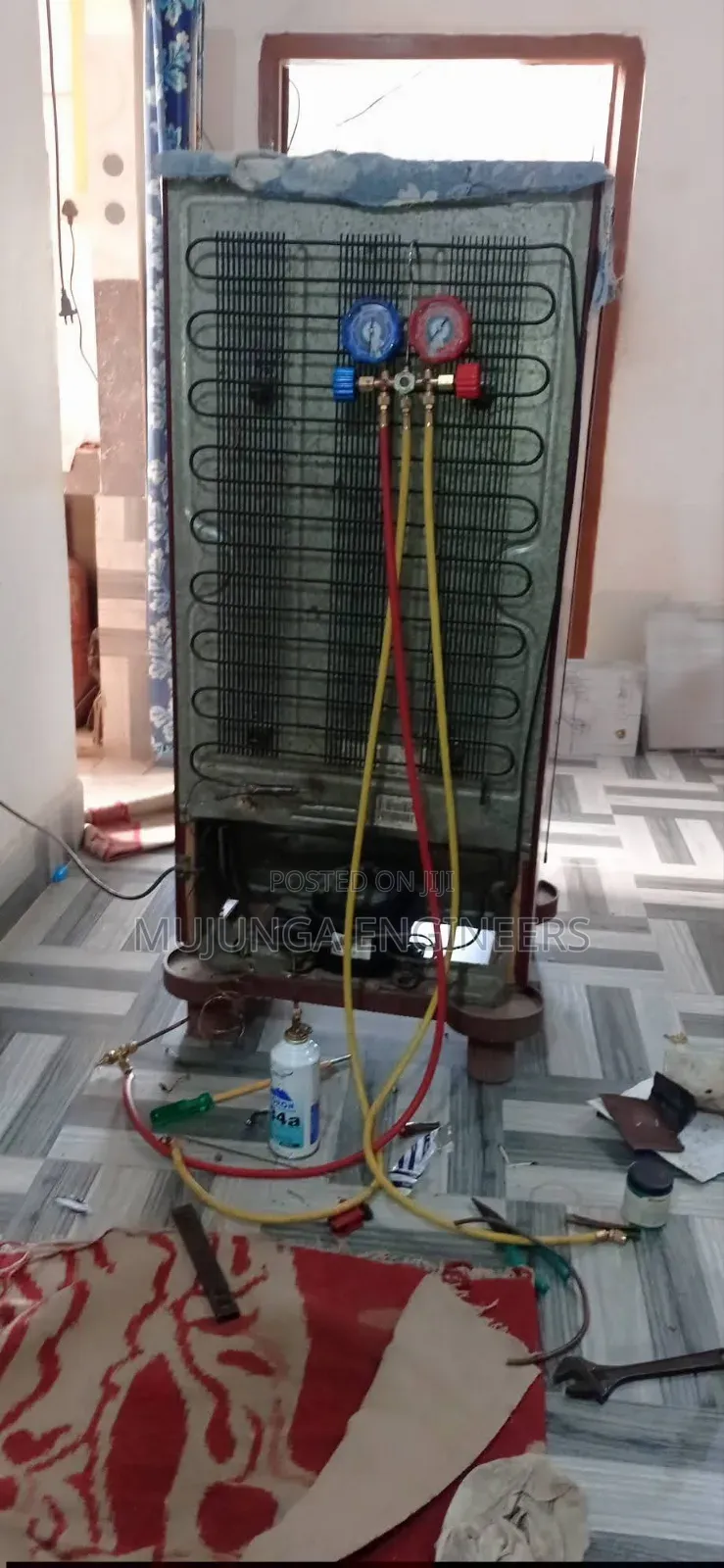 Fridge Gas Refill in Progress