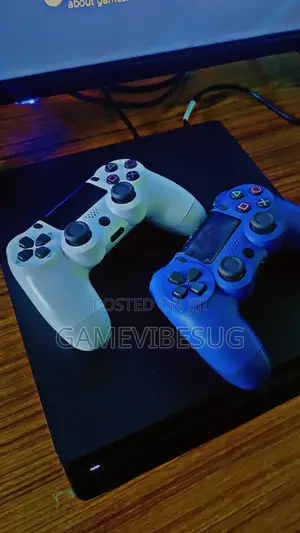 Mint Condition Ps4 Slim Pack: 10 Games, 2 Controllers Included