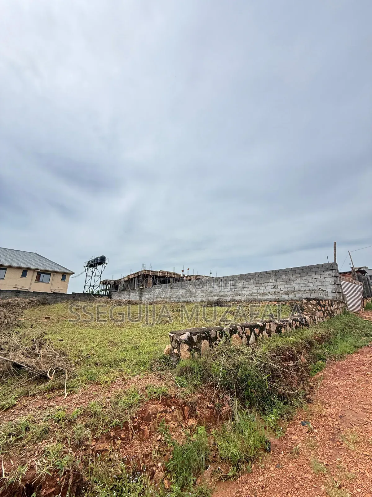 A Plot for Sale at Kira Nsasa 12dec at 70m Ugx