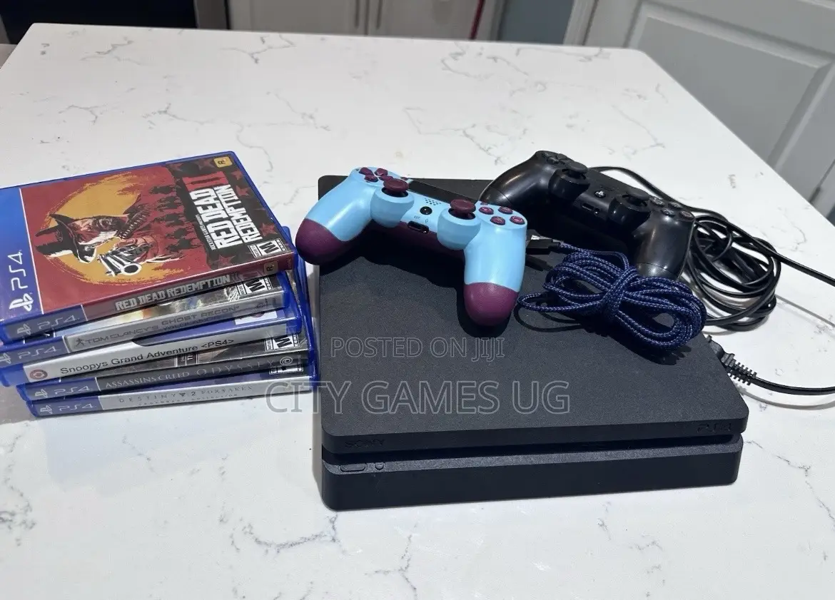 Sony Playstation 4 Slim Console - 2 Controllers 8 Games With Cords