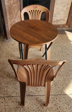 Round Table Wooden Table and Plastic Armless Chair