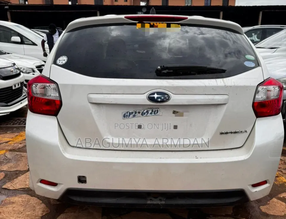 Subaru Impreza 2.0i Limited PZEV 4dr Hatchback AWD (2.0L 4cyl CVT) 2014