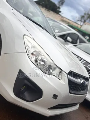 Subaru Impreza 2.0i Limited PZEV 4dr Hatchback AWD (2.0L 4cyl CVT) 2014