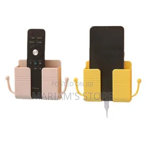 Plastic Wall Mount Organizer For Phones And Remote Controls.