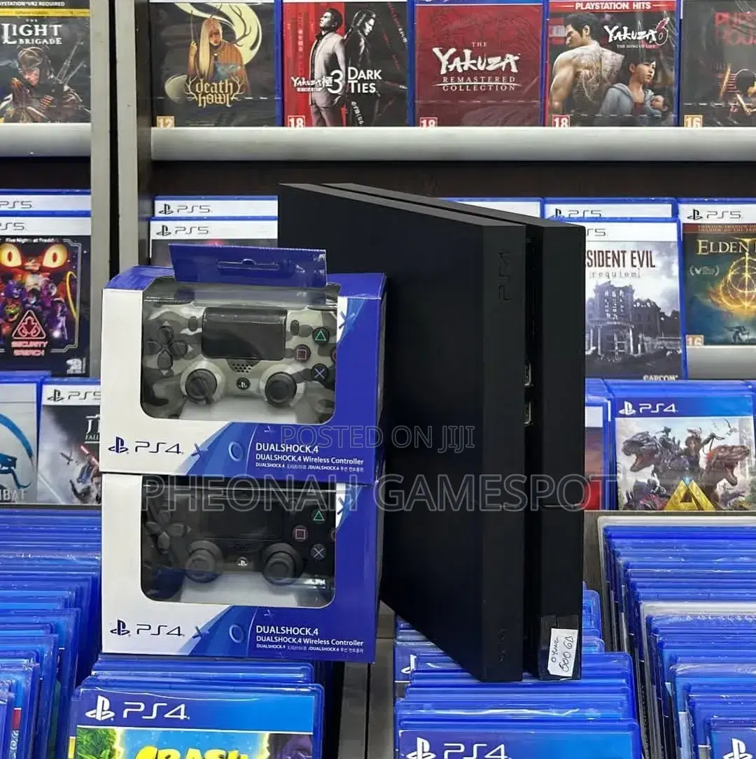 Get Your Original Ps4 Here. Comes With 12 Games and 2 Controllers.