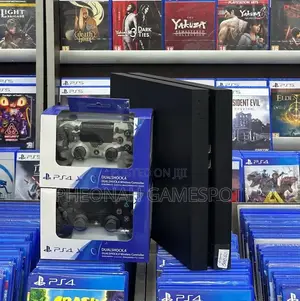 Get Your Original Ps4 Here. Comes With 12 Games and 2 Controllers.