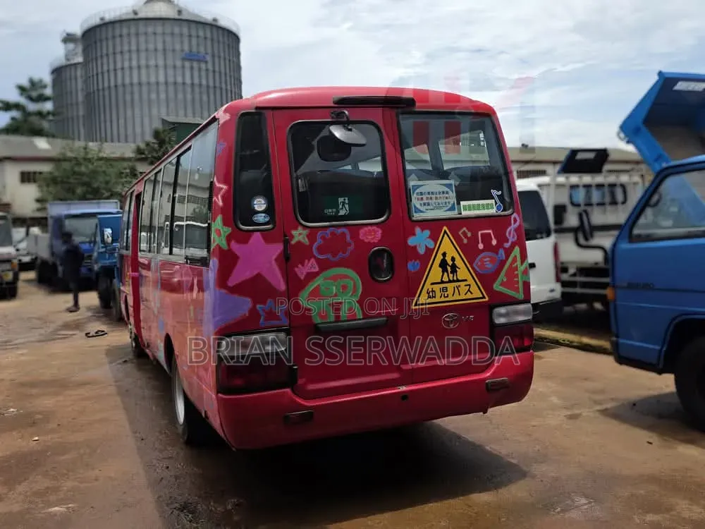 Toyota Coaster 2012 Red