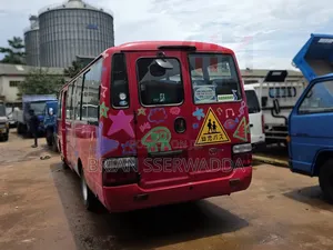 Toyota Coaster 2012 Red
