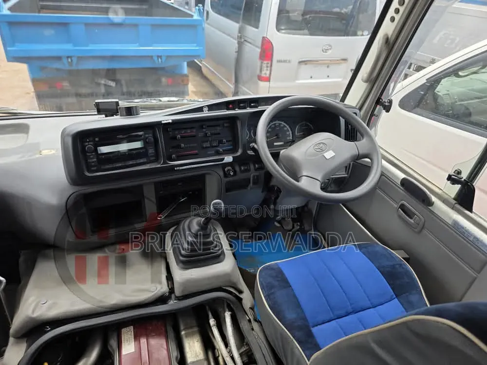 Toyota Coaster 2012 Red