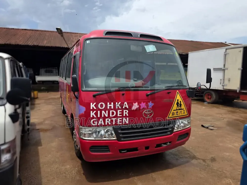 Toyota Coaster 2012 Red