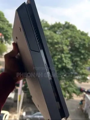 Ps4 Slim + 13 Games + 2 Pads = the Real Husband Material Right Here.