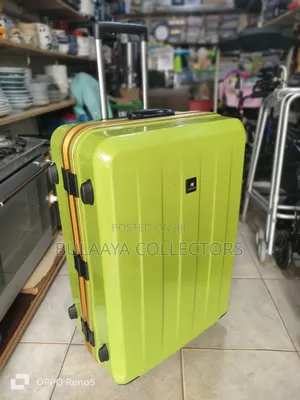 Japanese Bright Green Hardside Suitcase Is From the Brand Wintaro.