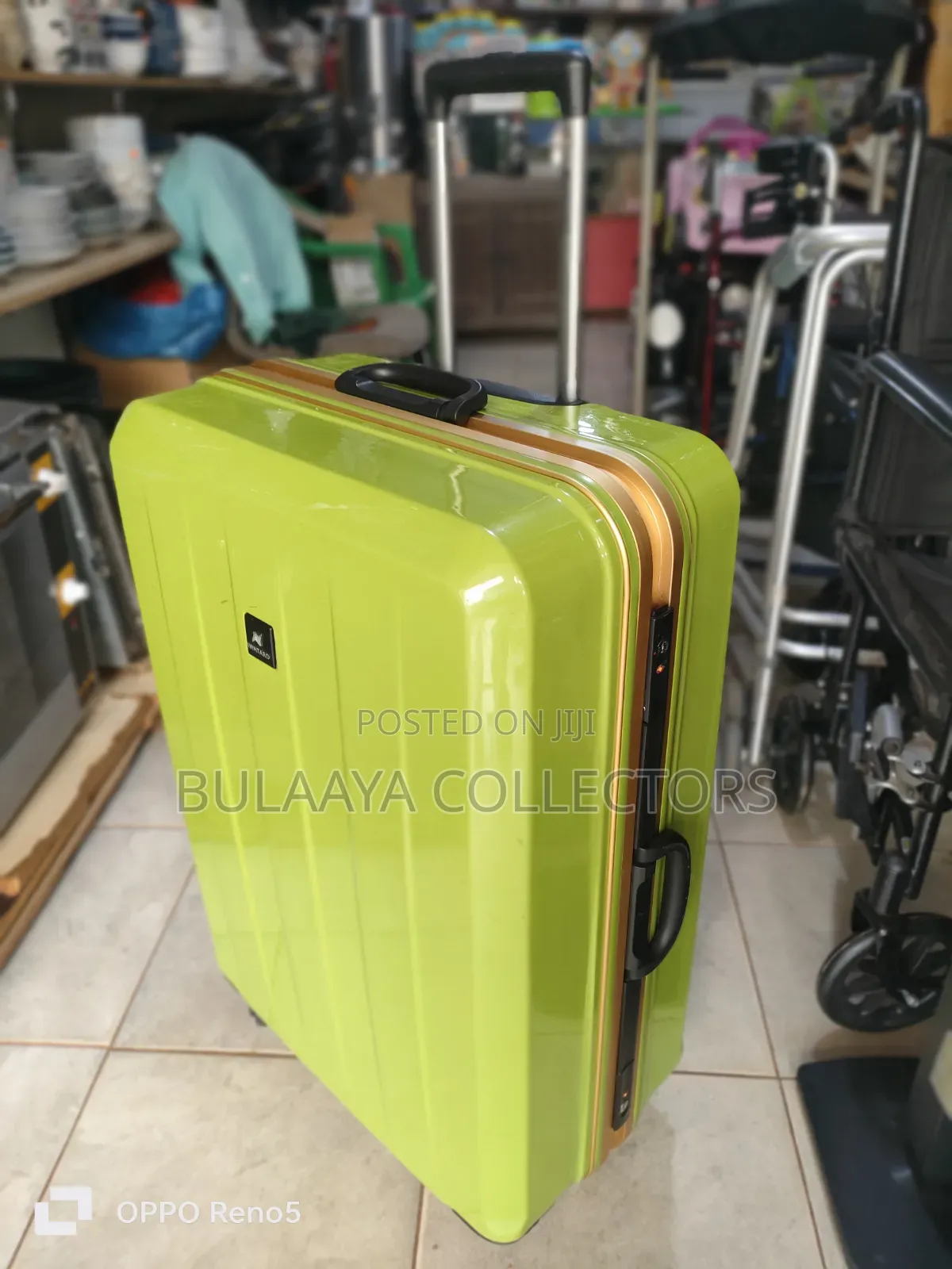 Japanese Bright Green Hardside Suitcase Is From the Brand Wintaro.