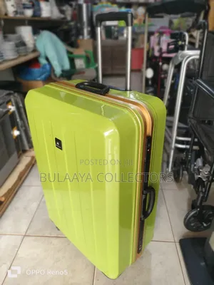 Japanese Bright Green Hardside Suitcase Is From the Brand Wintaro.
